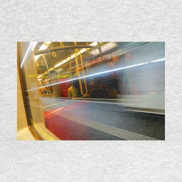 Commuters or passengers blurred in motion through window of passing train by brians101